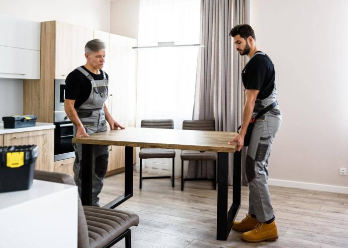 Workers-moving-personal-belonging